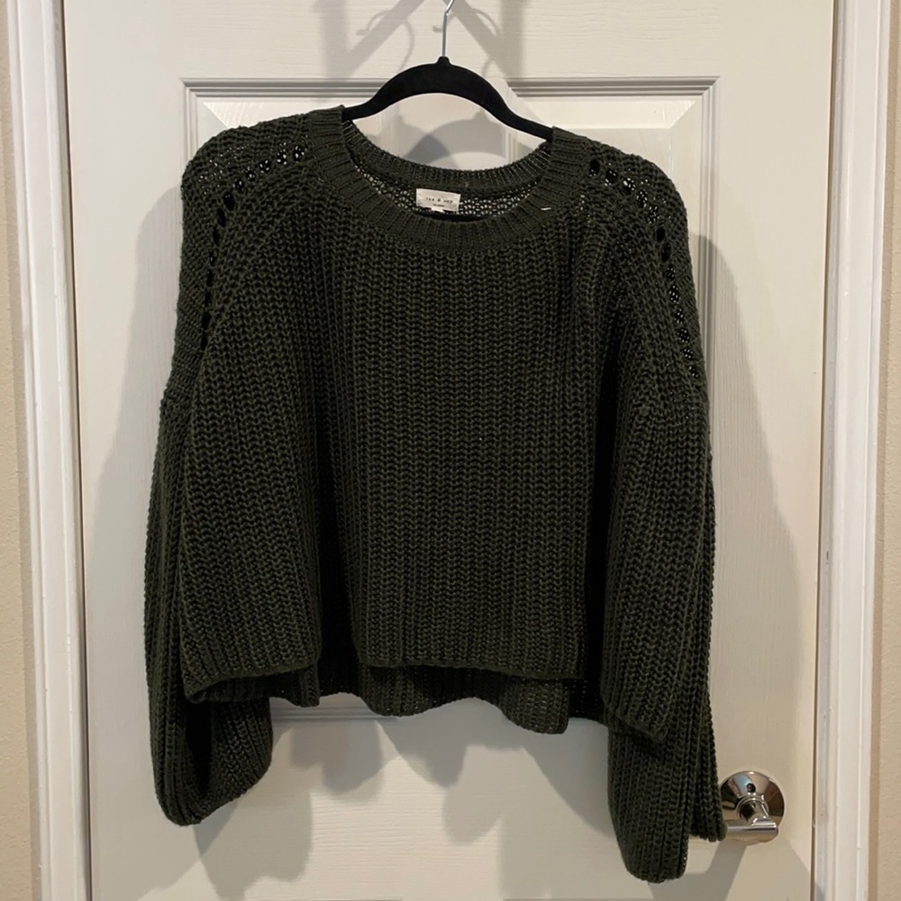 Green knitted sweater